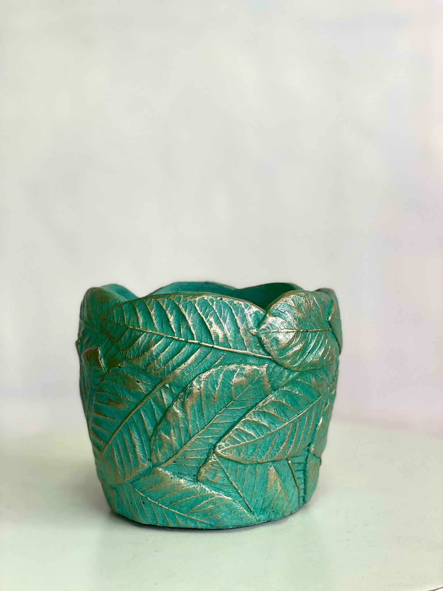 Maceta de concreto Hojas 13x13 cms